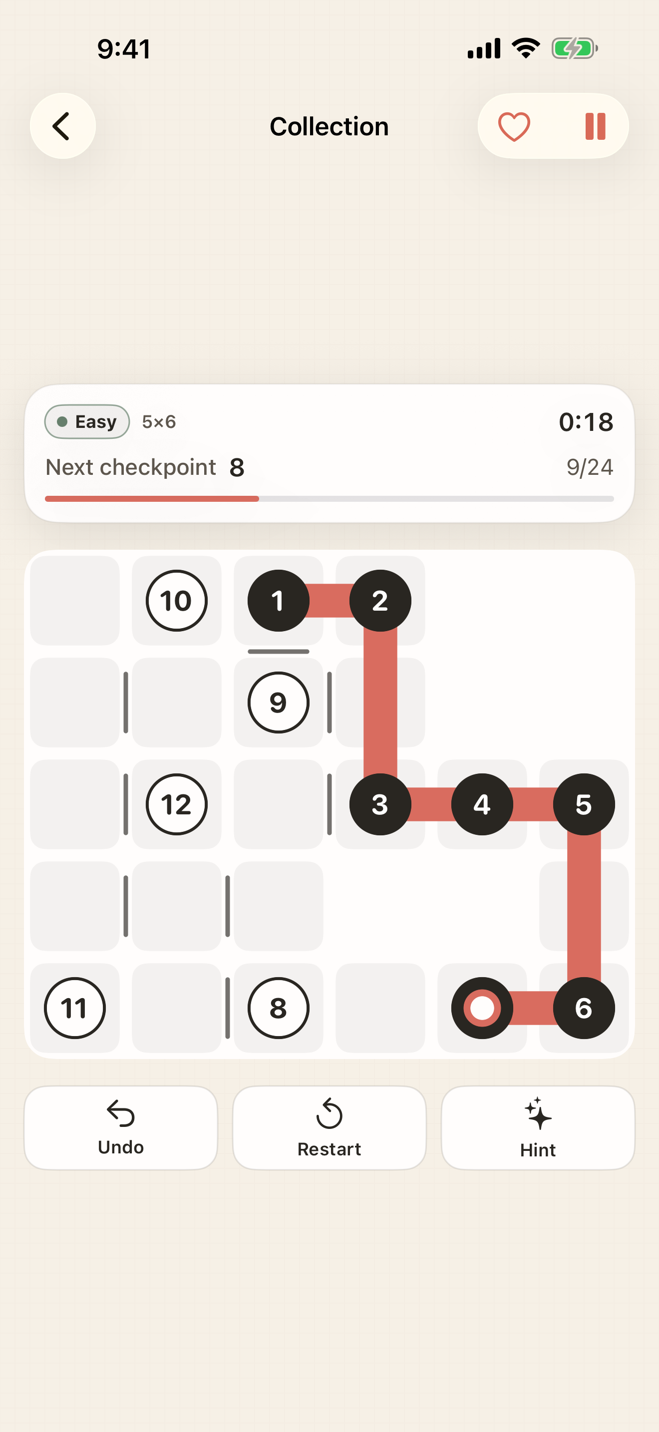 An actual Cutouts puzzle with missing squares and a partially drawn numbered route.
